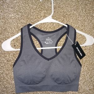 Medium Sized Grey with Black outlined sports bra
